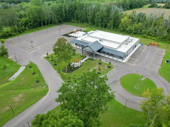Aerial view of the Legacy Events building, grounds, and parking